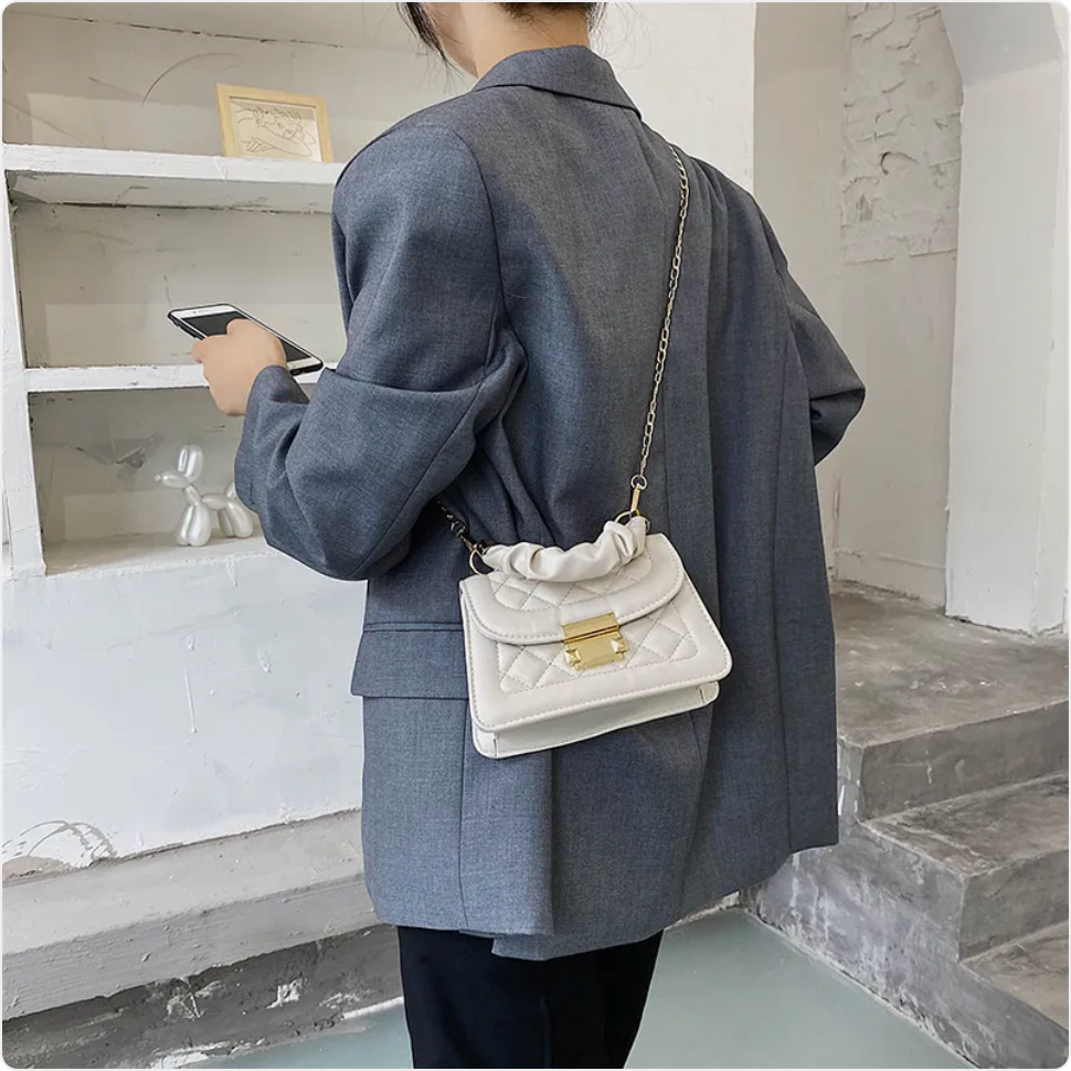 Small & Sophisticated Lockable Leather Handbag