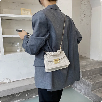 Small & Sophisticated Lockable Leather Handbag