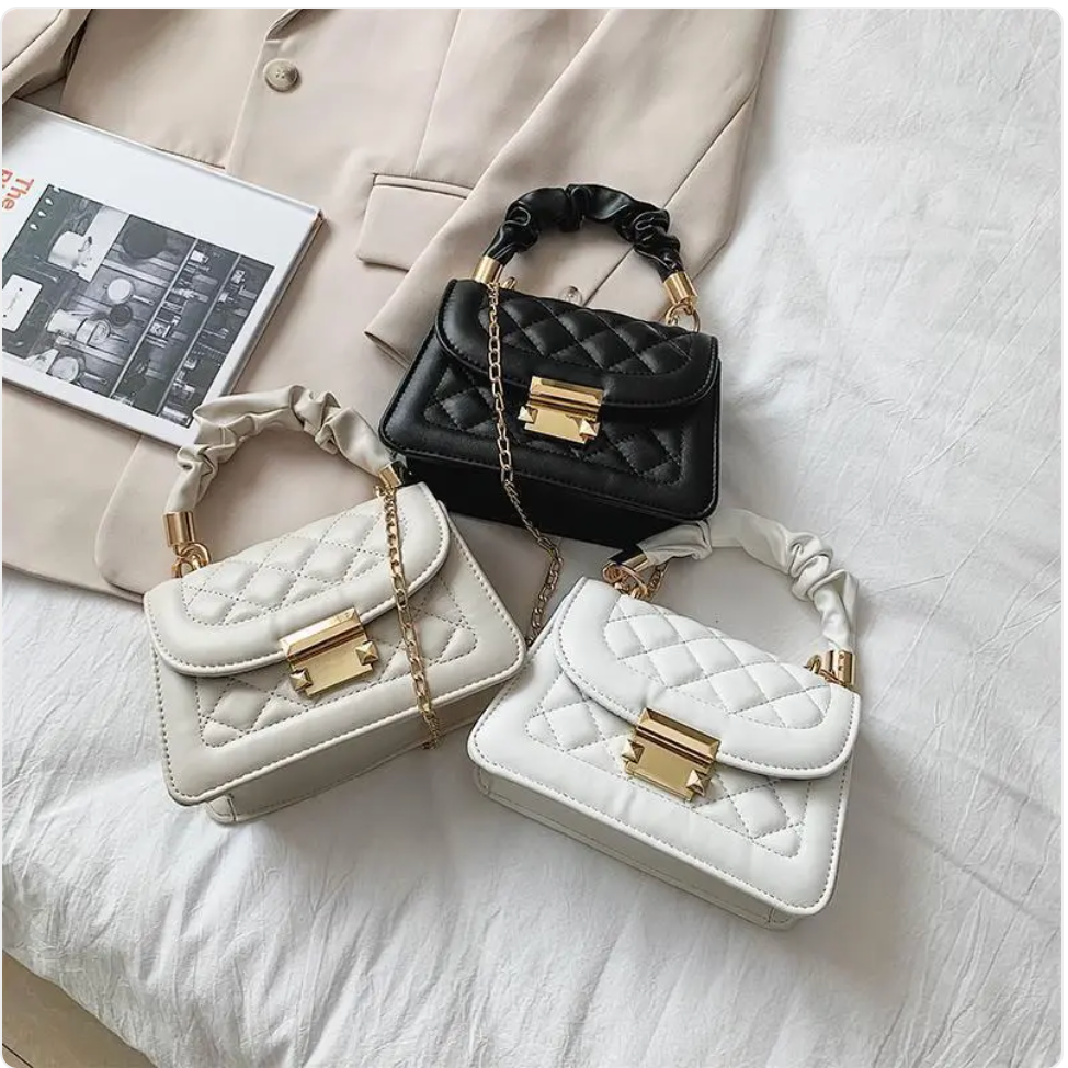 Small & Sophisticated Lockable Leather Handbag