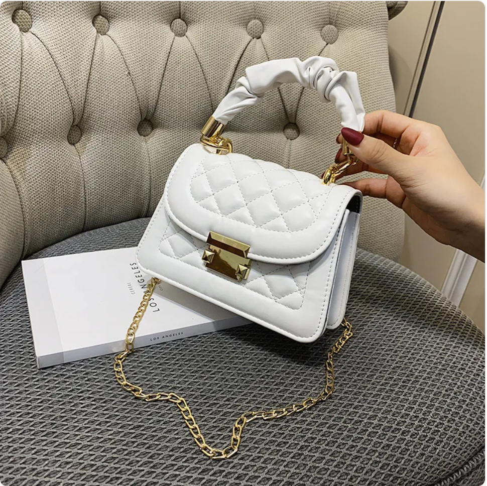 Small & Sophisticated Lockable Leather Handbag