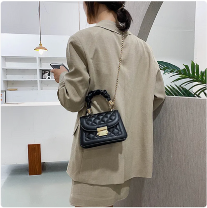 Small & Sophisticated Lockable Leather Handbag